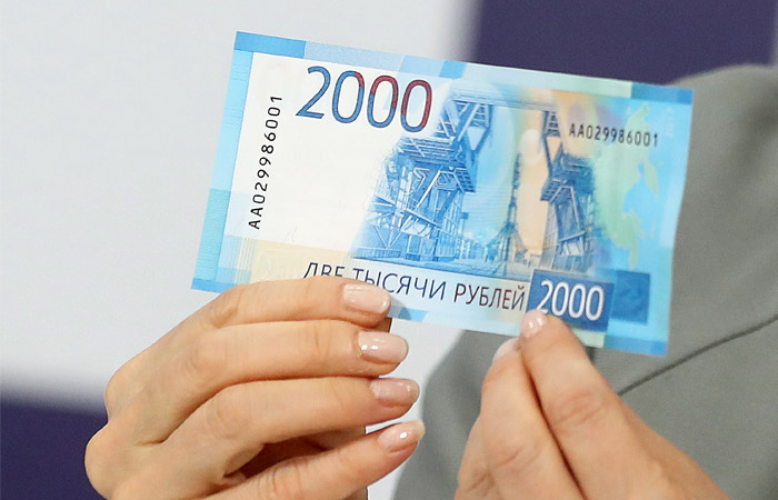 Масово банкноти будуть введені в обіг після настройки обладнання в грудні 2017 року   Фото: ТАСС, Артем Коротаєв   Москва